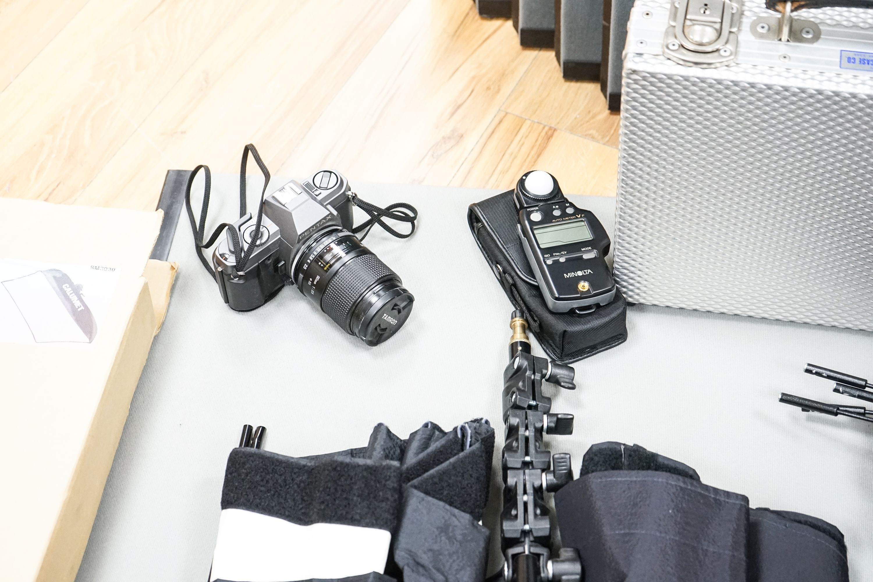 Professional photography equipment including a Pentax P30T SLR camera with Tamron 90mm f/2.5 lens, a pair of Bowens Esprit 1000 lights and a pair of Esprit 500 lights, a pair of Esprit 2 500 lights, various soft boxes, v